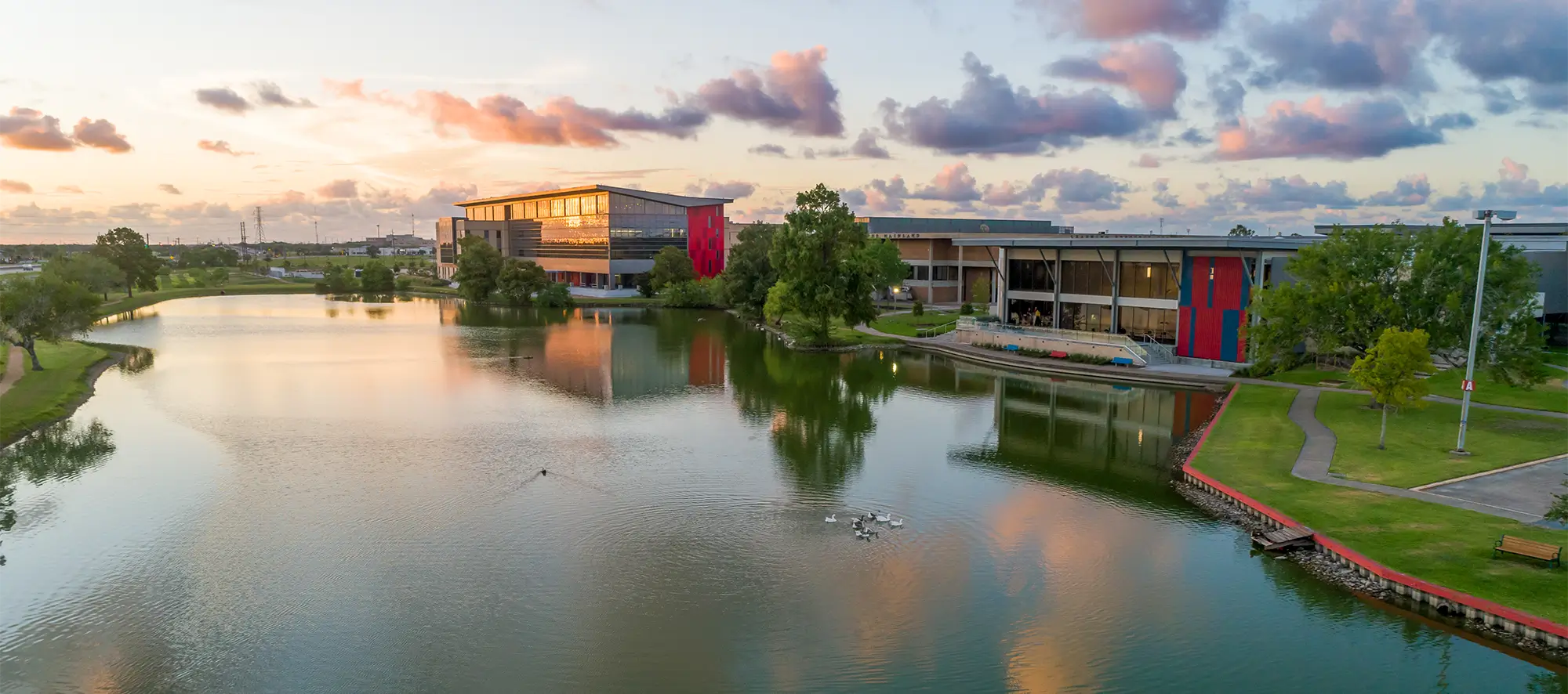 Birdseye view of COM campus and lake