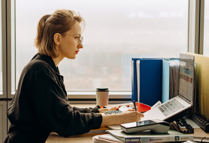Female professional working on a computer