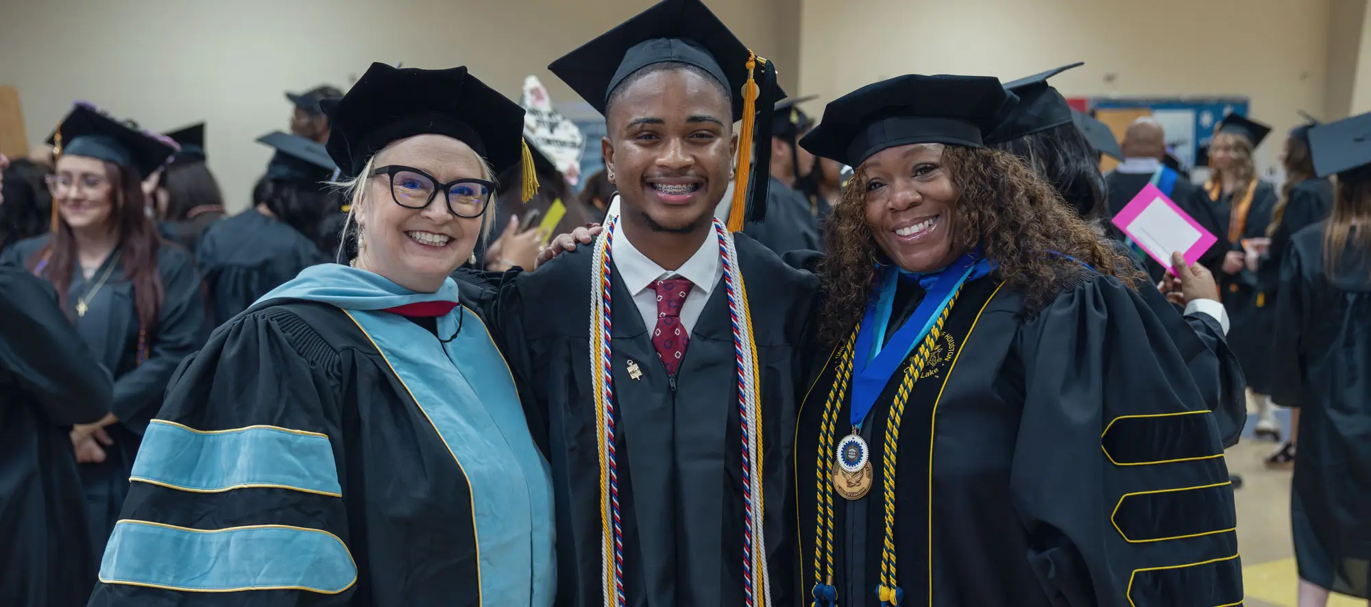 CHS Director and students at graduation