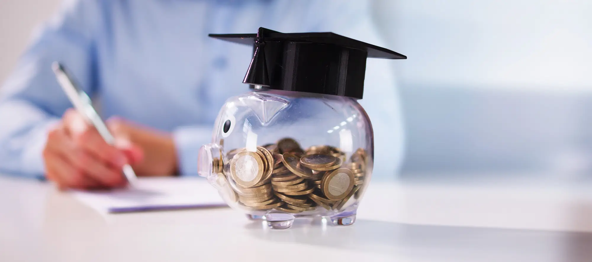 Piggy Bank With School Education Budget. Graduate Loan