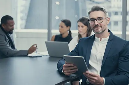 Business professionals in a conference room.