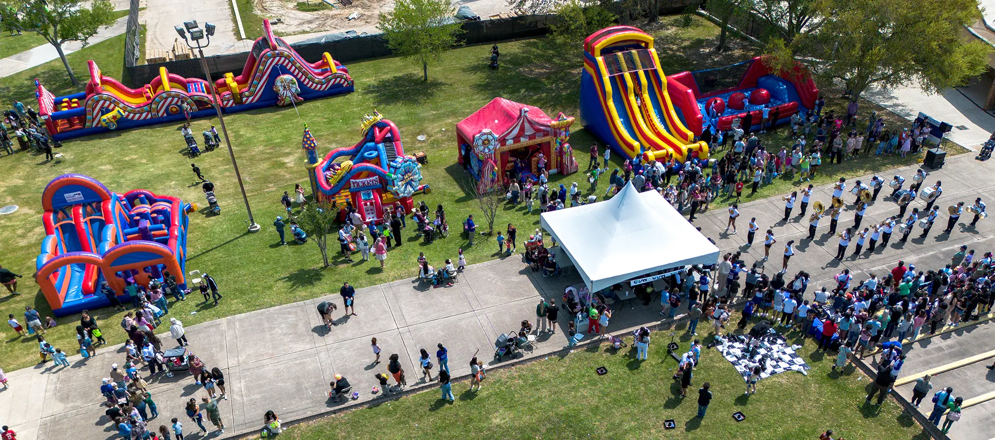 Birdseye view of College of the Mainland's Flock the Block event with bouncy houses and lots of people.