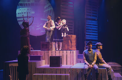 Theatre performers on stage