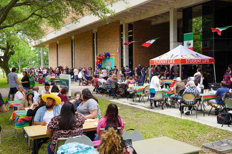 Students, staff and community members gather outside to enjoy food and lively entertainment during the 2023 Cinco de Mayo Celebration.