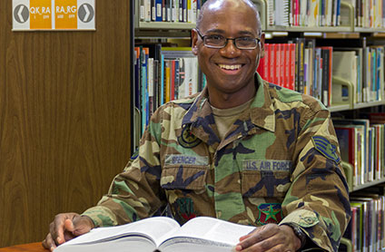Veteran Studying in Library