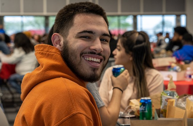 Smiling student at an event.