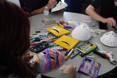 Students making dominican masks